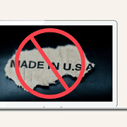 Laptop screen shows "Made in USA" with a red prohibition sign. Text next to it reads, "Kubota Slapped With Historic Penalty for False 'Made in USA' Claims.